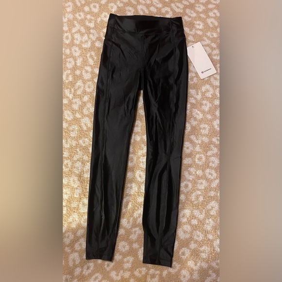 NWT Lululemon Satin Shine High-Rise Tight 25"
Black - Picture 2 of 8